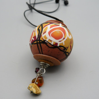 Crazy earth tones - hollow bead pendat with amber, garnet and jasper